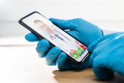 Man On Coronavirus Quarantine Calling Doctor