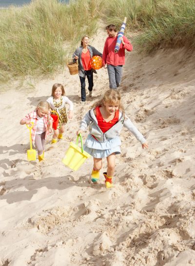 Family having fun on beach vacation