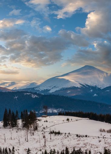 Evening winter cloudy day mountain ridge