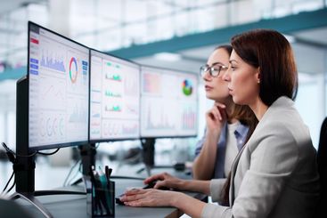 Female Data Analyst Analyzing KPIs