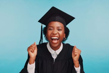 Black woman, graduation and celebration in studio...