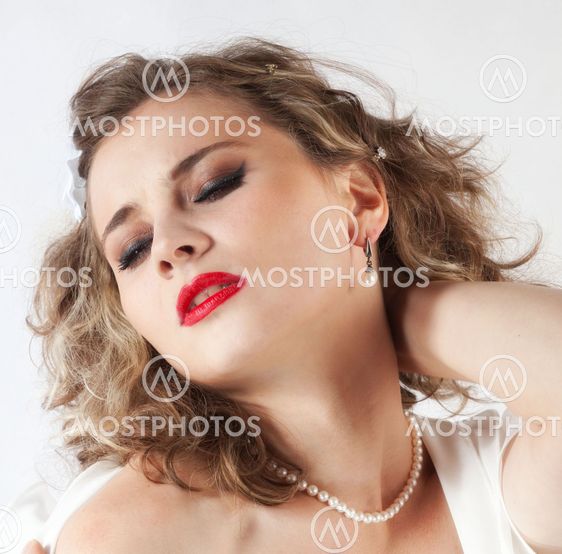 Beautiful young girl with eyes closed