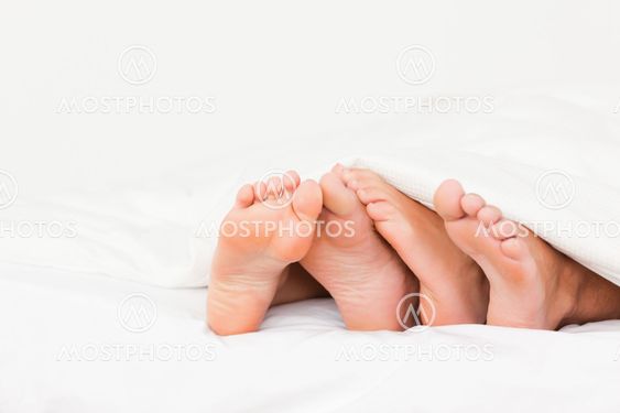 Four feet in a bed