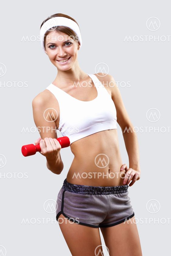 Young pretty woman in sport wear