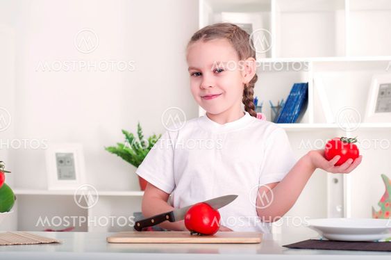 girl cooking vegetables