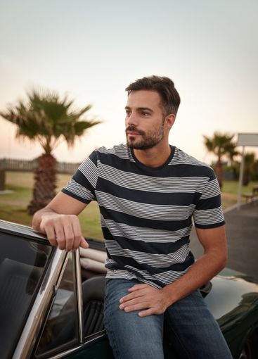 Thinking, road trip and man in car in park for solo...