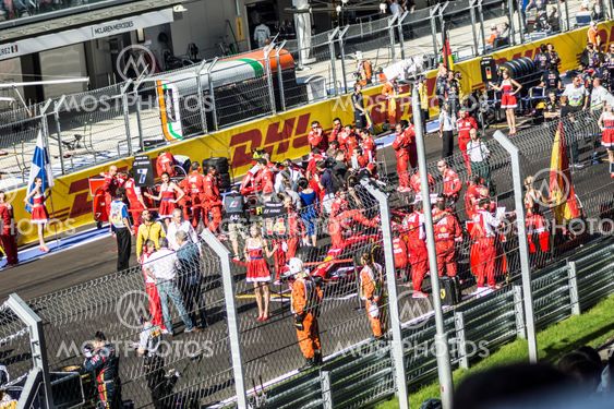 The Scuderia Ferrari team on the grid.