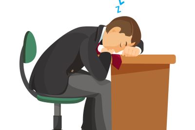 Man asleep at desk side view. Male sleeping on table.