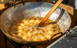 Delicious Asian street food market with takeaway meals,...