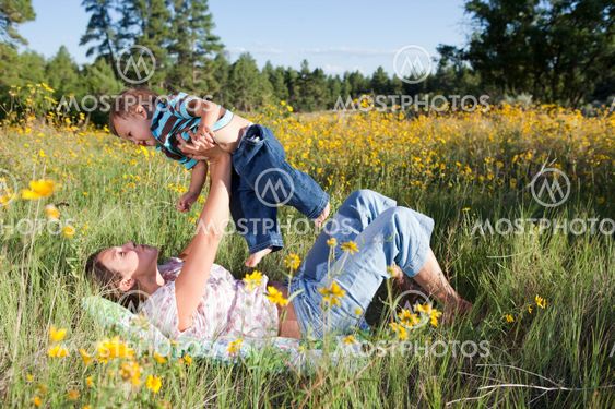 Mother and baby boy cuddling