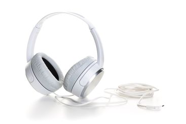 White headphones on white background close up