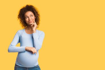 Pregnant woman dreaming, imagining motherhood life, free...