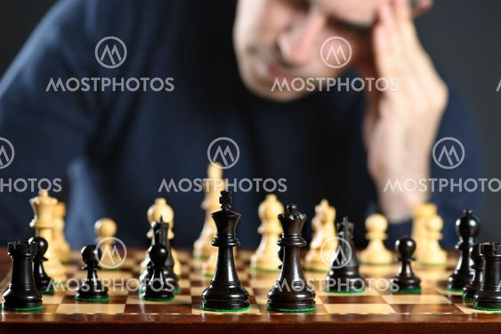 Man at chess board