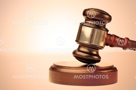 Brown gavel and scale of justice