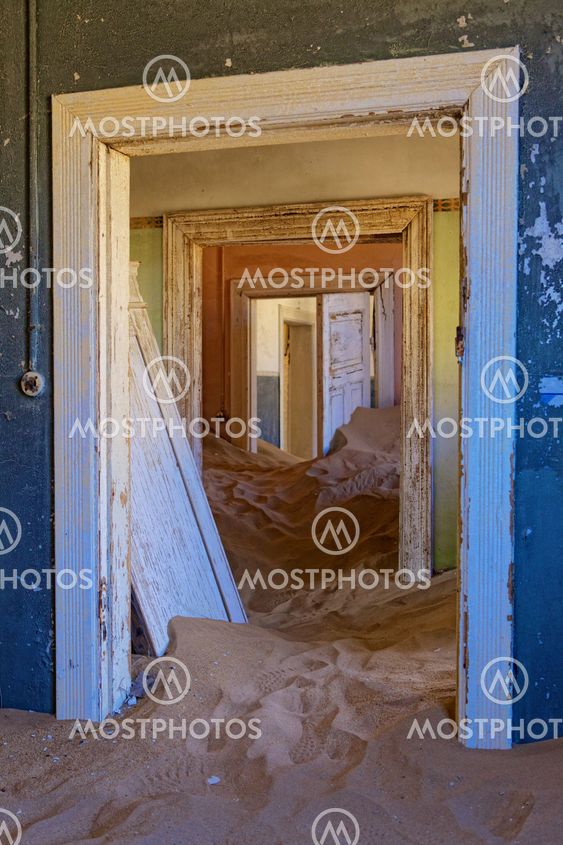an house overtaken by dune sand at kolmanskop ghost town near luderitz