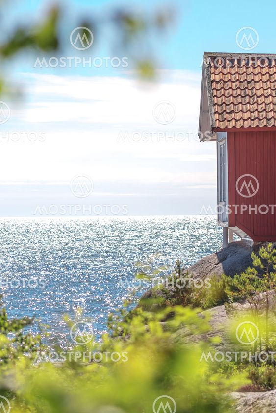 The writing Albert Engstrom writing cabin at the shore of...