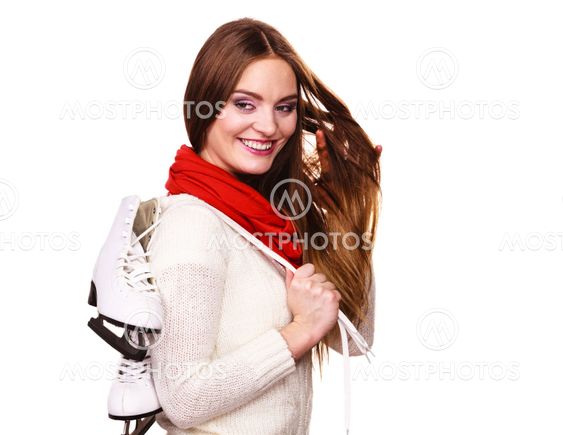 Attractive girl with ice skates.