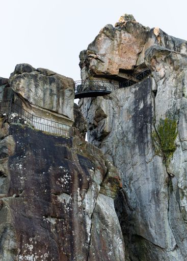 Large rocky rocks. Rocks of rocks. Gray moss-covered rocks