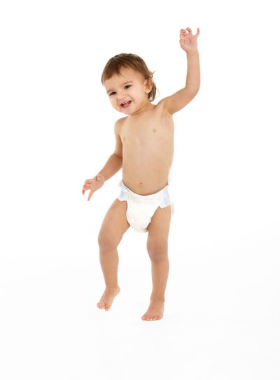 Studio Portrait Of Baby Boy Standing