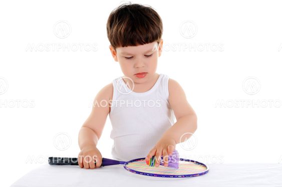 little boy with a racket