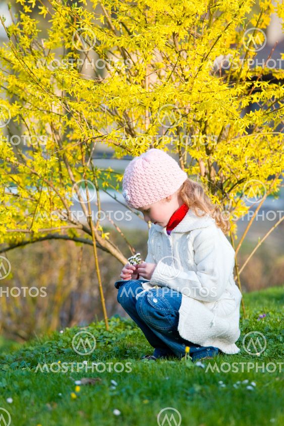 small girl in spring park