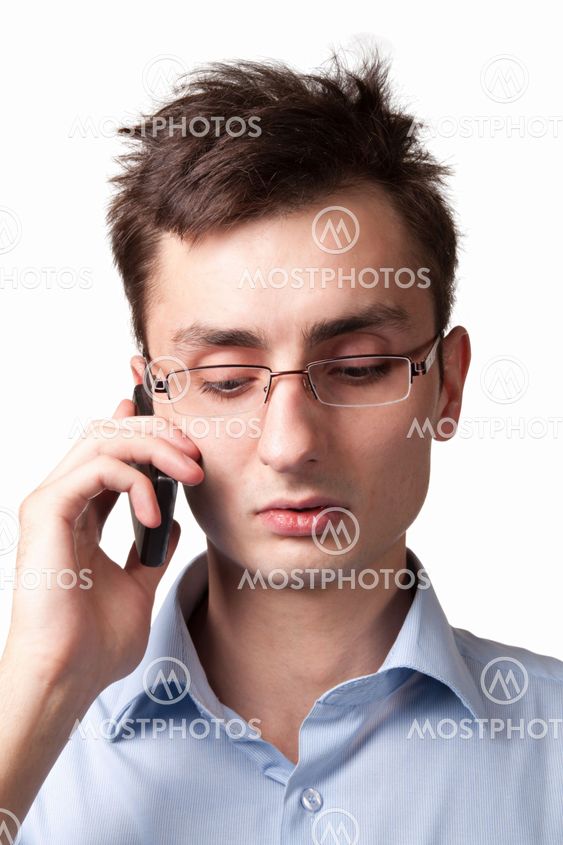 Young businessman talking on the mobile phone