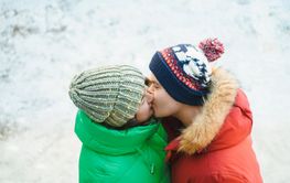 Winter plus size couple lovestory. Happy smiling man,...