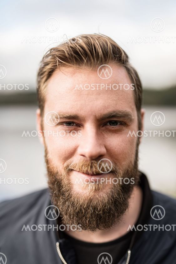 Portrait of a bearded man outdoors