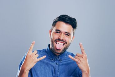 Space, happy or portrait of man with rock hand gesture...
