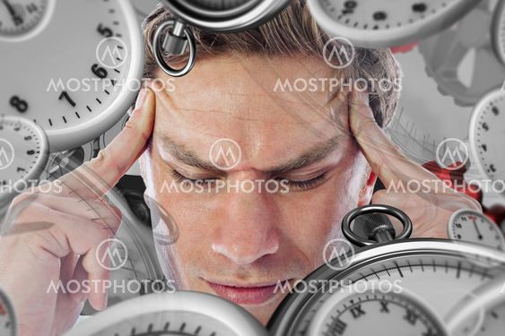 Composite image of businessman with a headache