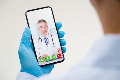 Man On Coronavirus Quarantine Calling Doctor