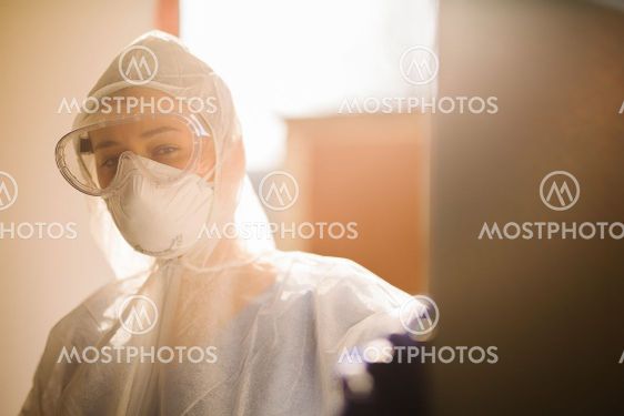 Paramedic in equipment against the backdrop of sunlight....