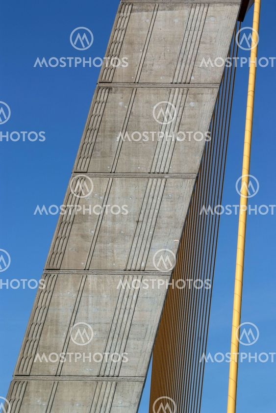 Detail of bridge construction over blue sky