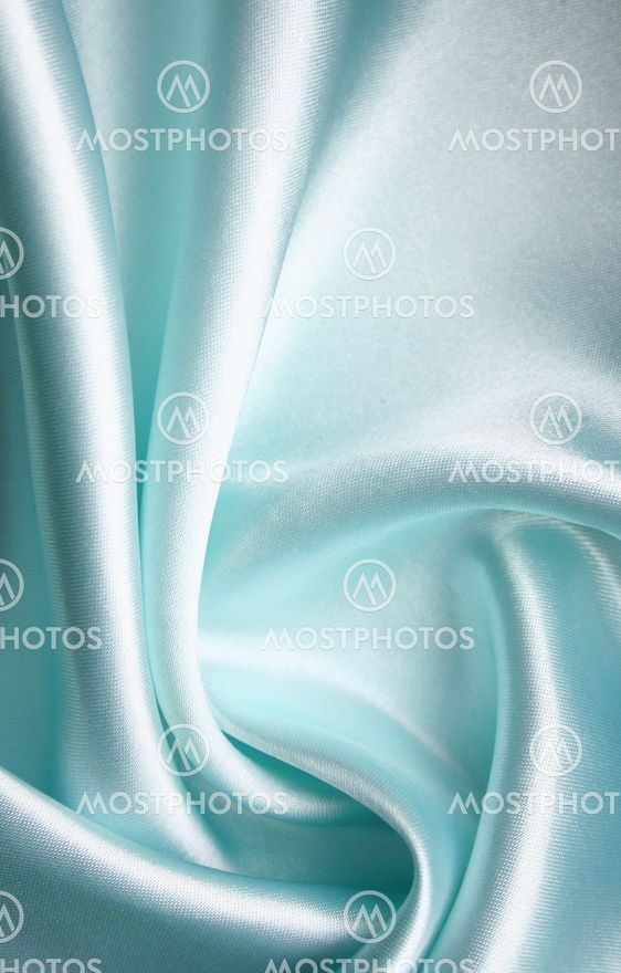 Smooth elegant blue silk as background