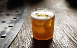 Cocktail on a bar counter in a pub.
