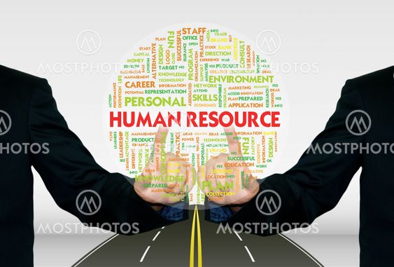 Man pushing the business word cloud on transparent screen