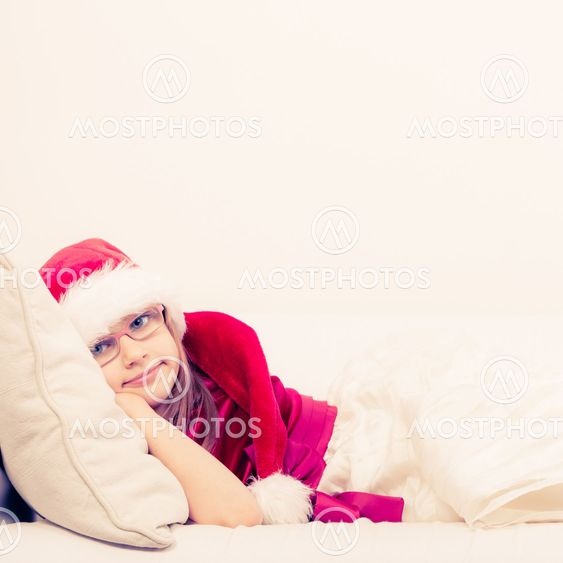 Cute little lady crawling on sofa.