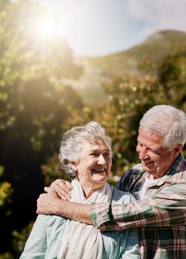Nature, senior couple and happy together in garden with...