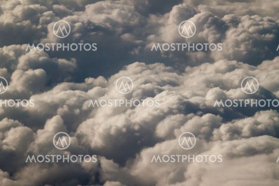 dramatic blue sky with clouds and sun rays