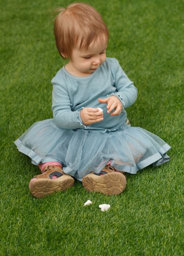 Adorable little child girl outdoors. Childhood