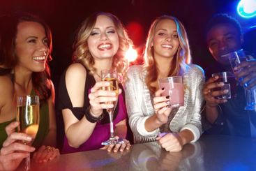 Happy, portrait and friends with alcohol in nightclub...