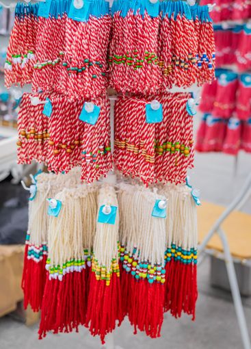 Rows of Martenitsa tassels displayed at traditional...