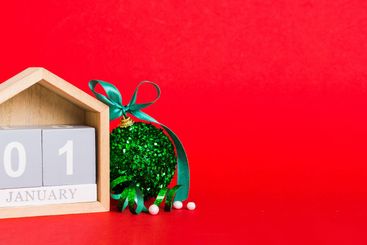 1 january. Christmas composition on colored background...