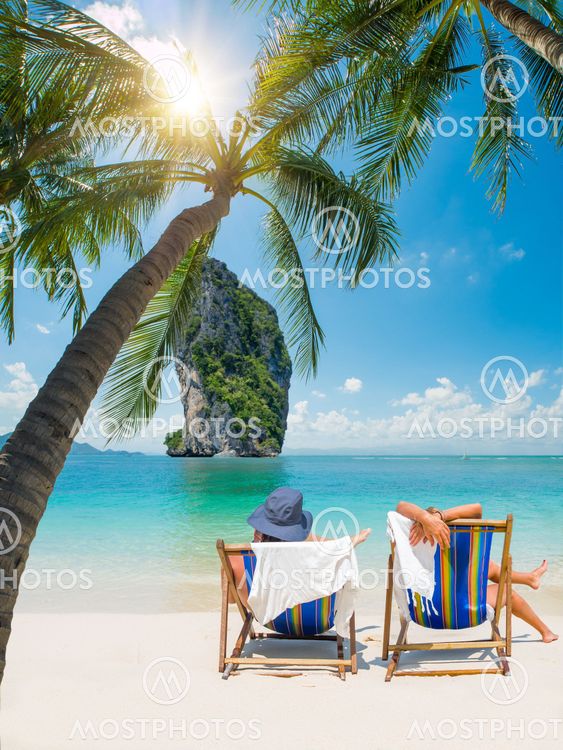 Couple of tourists on the beach