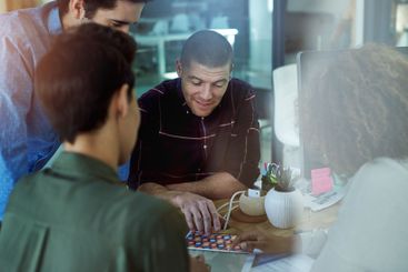 Collaboration, color design and tablet with business...