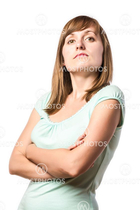 Arrogant looking young standing woman