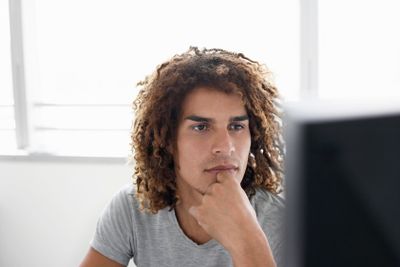 Office Worker Looking At Computer Monitor