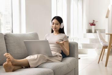 Young woman engaged in virtual meeting event