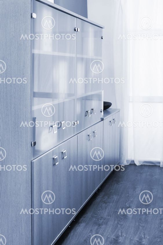 bookcase with glass doors in office