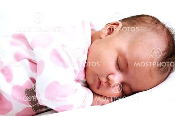 close-up of newborn baby peaceful and asleep